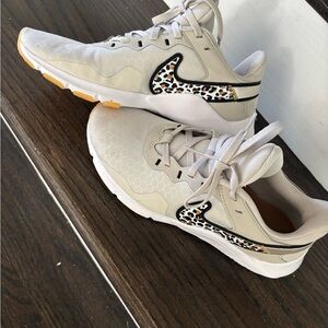 Nike Cream and Black Athletic Shoes with Leopard Detail